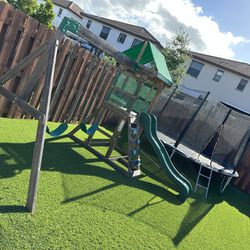Wood Swing Set and Trampoline 