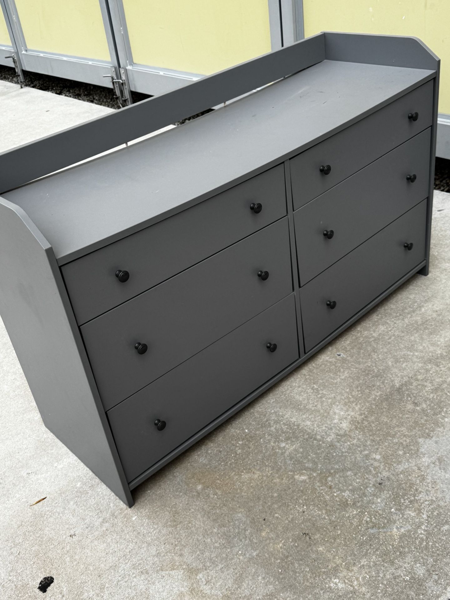Table And A Clothing Drawer
