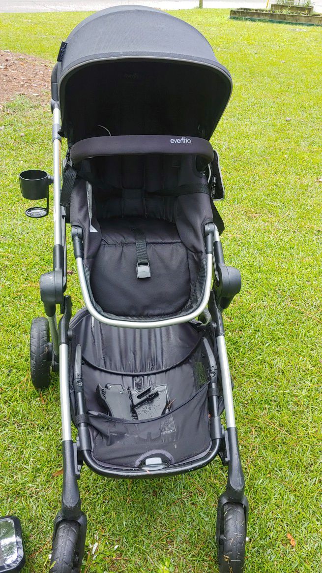 Evenflo pivot expand stroller with car seat attachments, stroller caddy and mirror