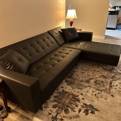 New Black Or White Leather Sectional/ Convertible Bed.  99x62x33H; 72x70x23H.  Free Delivery.