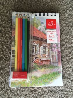Coloring Pencils And Sketch Book
