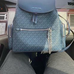 Designing :MICHAEL KORS