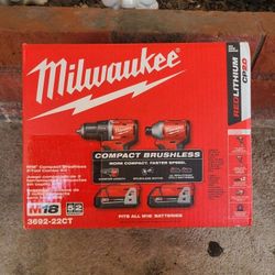 Milwaukee M18 Brushless Drill And Impact 2-2.0 Batteries And Charger 