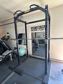Rack and Olympic barbell. Powertec strength.