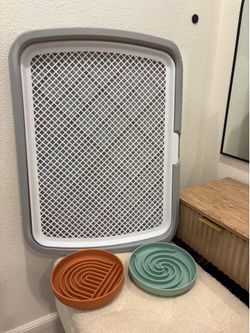 Used like new Puppy Pee Tray and Slow Feeders