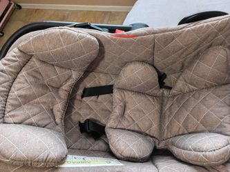 Brown carseat universal from maternity miracles.