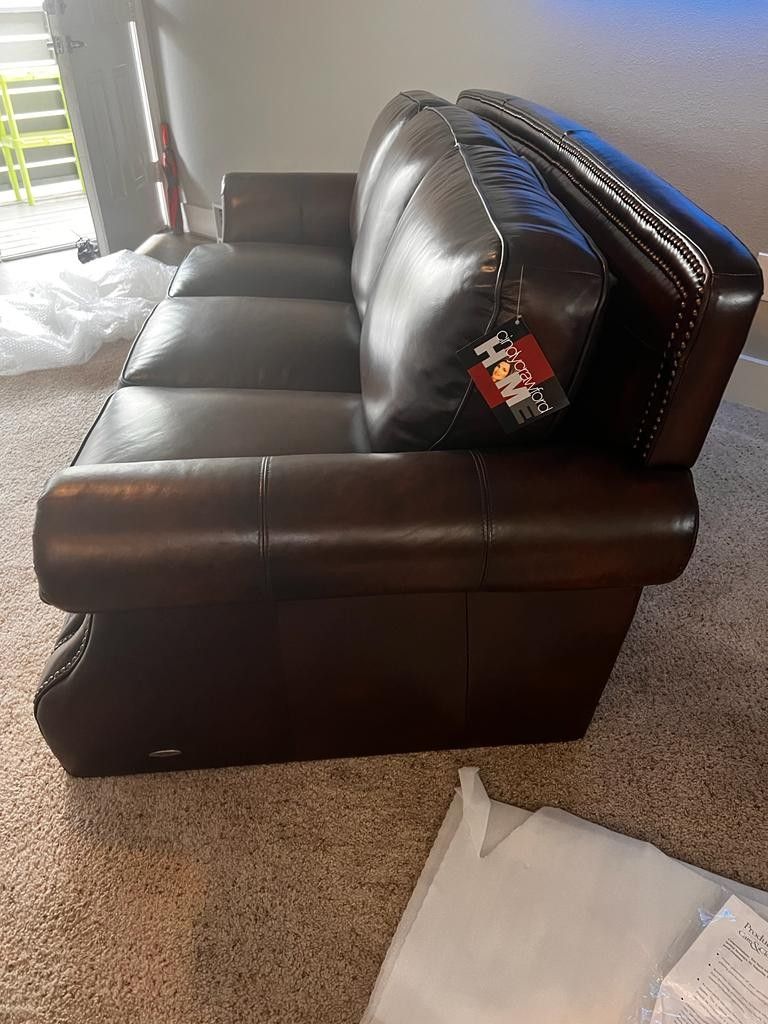 CINDY CRAWFORD HOME CALVANO BROWN LEATHER SOFA from ROOMS TO GO
