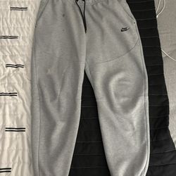 nike tech pants large 