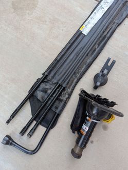 Chevy Silverado Tahoe OEM jack. Wrench.

Bars