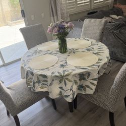 Table And 4 Chairs With Cover