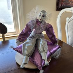 VINTAGE porcelain clown on pillow music box