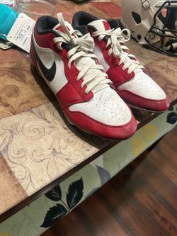 Red low jordan 1 cleats size 13