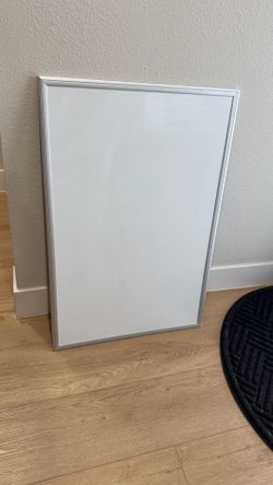 Two white boards (2’x3’) with some accessories