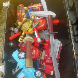 Two Boxes Of Children Toys… Cars , Monster Jam , Ninja Turtle, Rayan , Sonic.. Excellent Condition !!