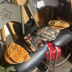 Baseball Gloves 4 $40 For All two adult gloves, one youth and one catching glove