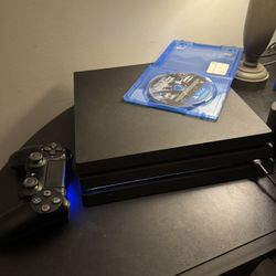 Ps4 pro w/modern warfare and 2 controllers