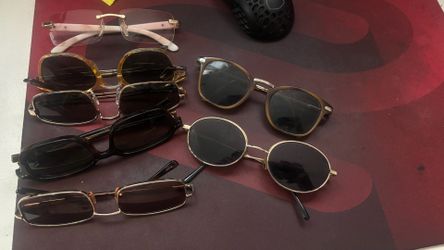 7 pairs of sunglasses