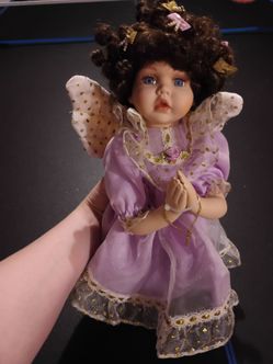 Porcelain angel doll