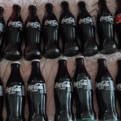 VINTAGE COMMERATIVE EDITION COCA COLA BOTTLES