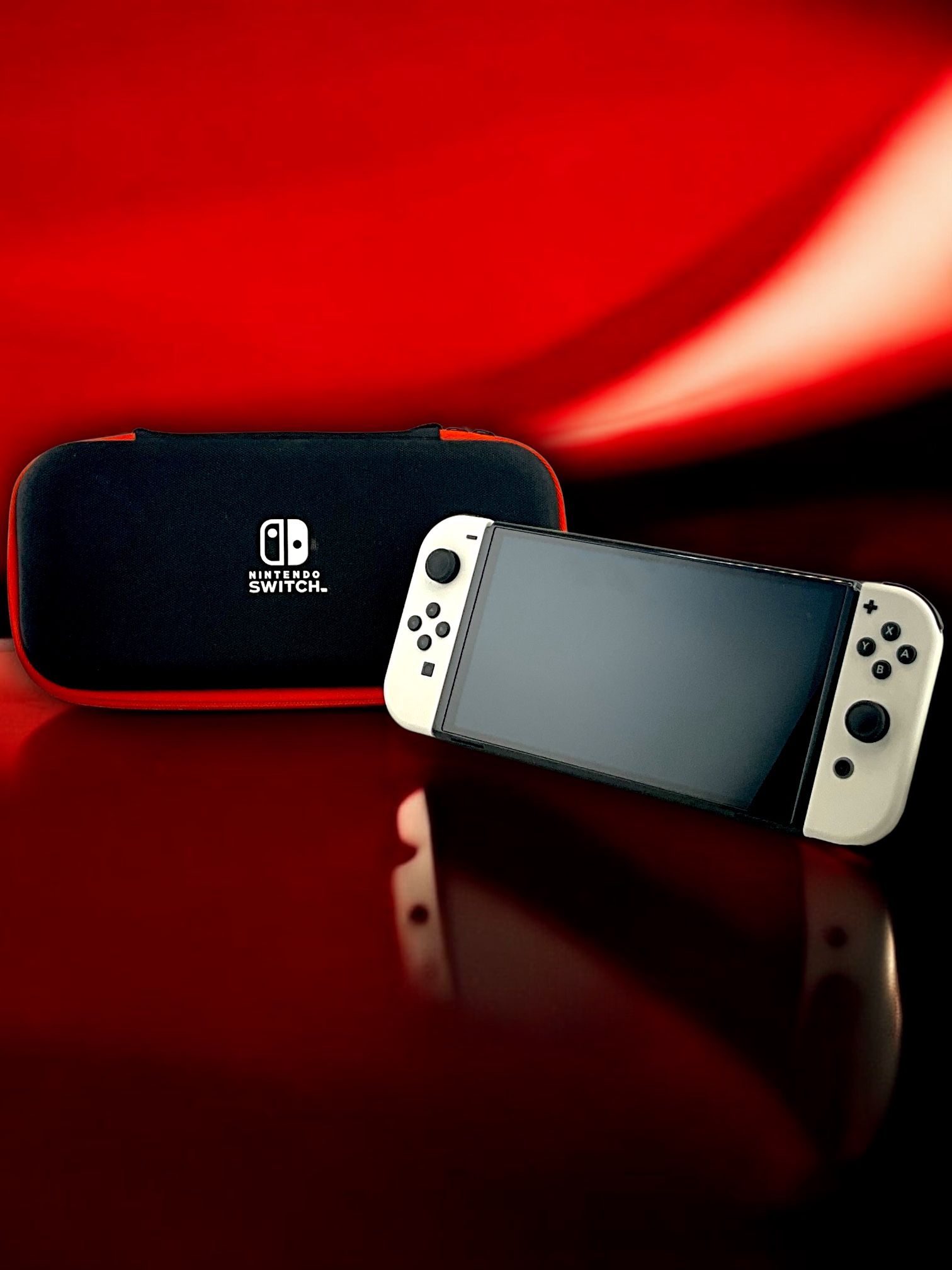 Nintendo Switch OLED with Case and Charger.