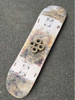 Used skateboard deck and wheels
