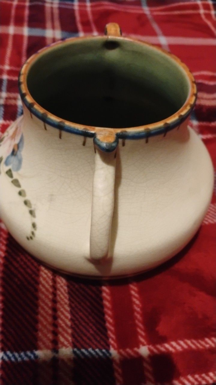  Vintage Ceramic Pot with Dual Handles Hand-Painted Floral Design Beautiful vintage ceramic pot featuring two ornate loop handles and a hand-painted.
