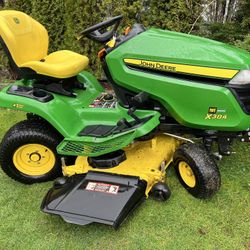 John Deere X384 All-Wheel Steer