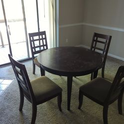 Dining room wooden table with 4 wooden chairs
