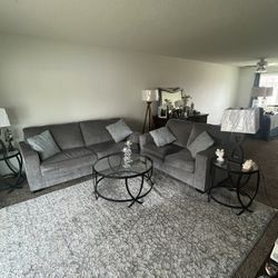 Beautiful 7  Newer Piece Couch, Loveseat, Glass with Black Trim Coffee Table, Two End Tables with Modern Black Lamps (Bought about 1 year ago new from
