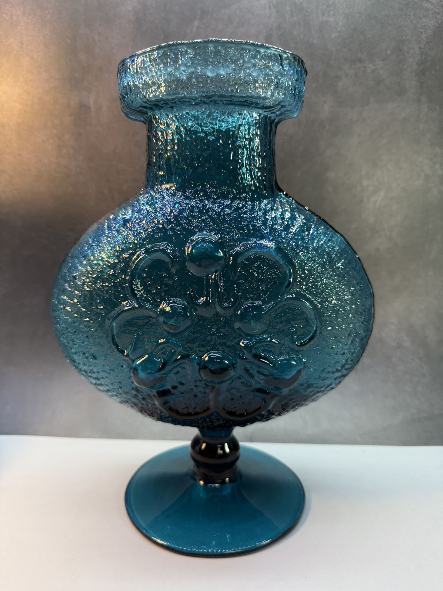 Beautiful Vintage Mid-Century Modern Stelvia Empoli "Antigua" glass vase in turquoise blue, designed by Wayne 10.5 in tall. Raised Flower Design (1970