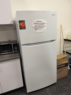 Fridge with top freezer