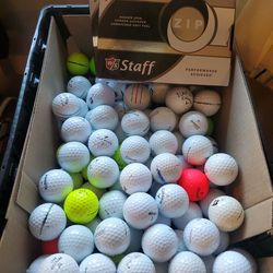 125 like new golf balls plus 2 dozen brand new Wilson staff  $50