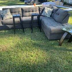 Smoke Grey Sectional, 2 End Tables, 2 Bar Stools