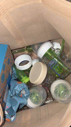 Glass dr brown bottles with baby boy clothes
