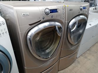 GE Profile tan front load washer and dryer set on pedestals - Free delivery