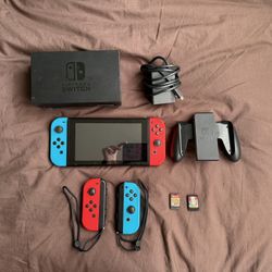 Nintendo Switch Console with Joy-Con Controller, 2 Extra Joycons, and Minecraft + Lego Worlds Games