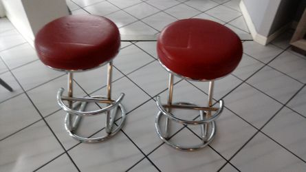 Two stools 24 and a half inches high, new condition