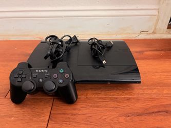 PS3 with box and cords,controller