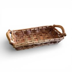 Vintage rectangular wicker tray or bread basket featuring woven rattan and sturdy handles for serving or decorative display.