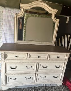Dresser with mirror. Distressed finish. Like new condition.