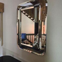 Chrome Mirror Featuring  a Rounded Corners