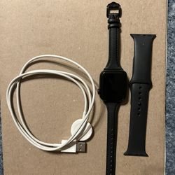 Apple Watch With Original Band Plus An Extra Band And Charger 