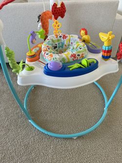 Fisher-Price Jumperoo Baby Bouncer and Activity Center with Spinning Seat Plus Lights Music Sounds and Baby Toys