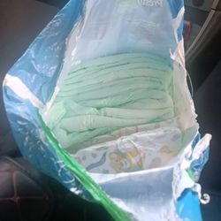 Few Left Baby Diapers Size 4 And Medium Diapers 