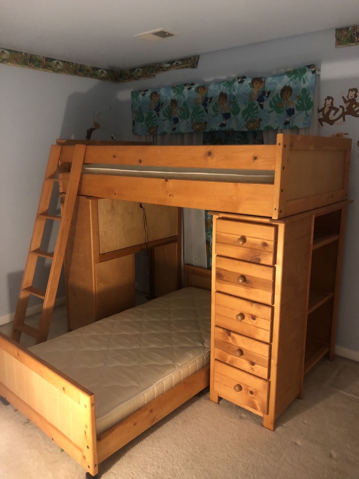 Bunkbed with desk and shelves