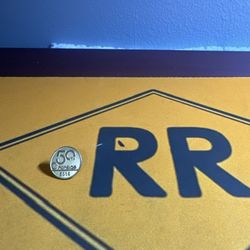 This vintage ceramic jewelry box is a must-have for any collector or lover of unique decorative pieces. The box features a beautiful white rose design