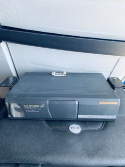 6 disc Alpine CD changer with Honda adapter harness.