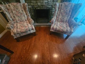 2 wing chairs with covers