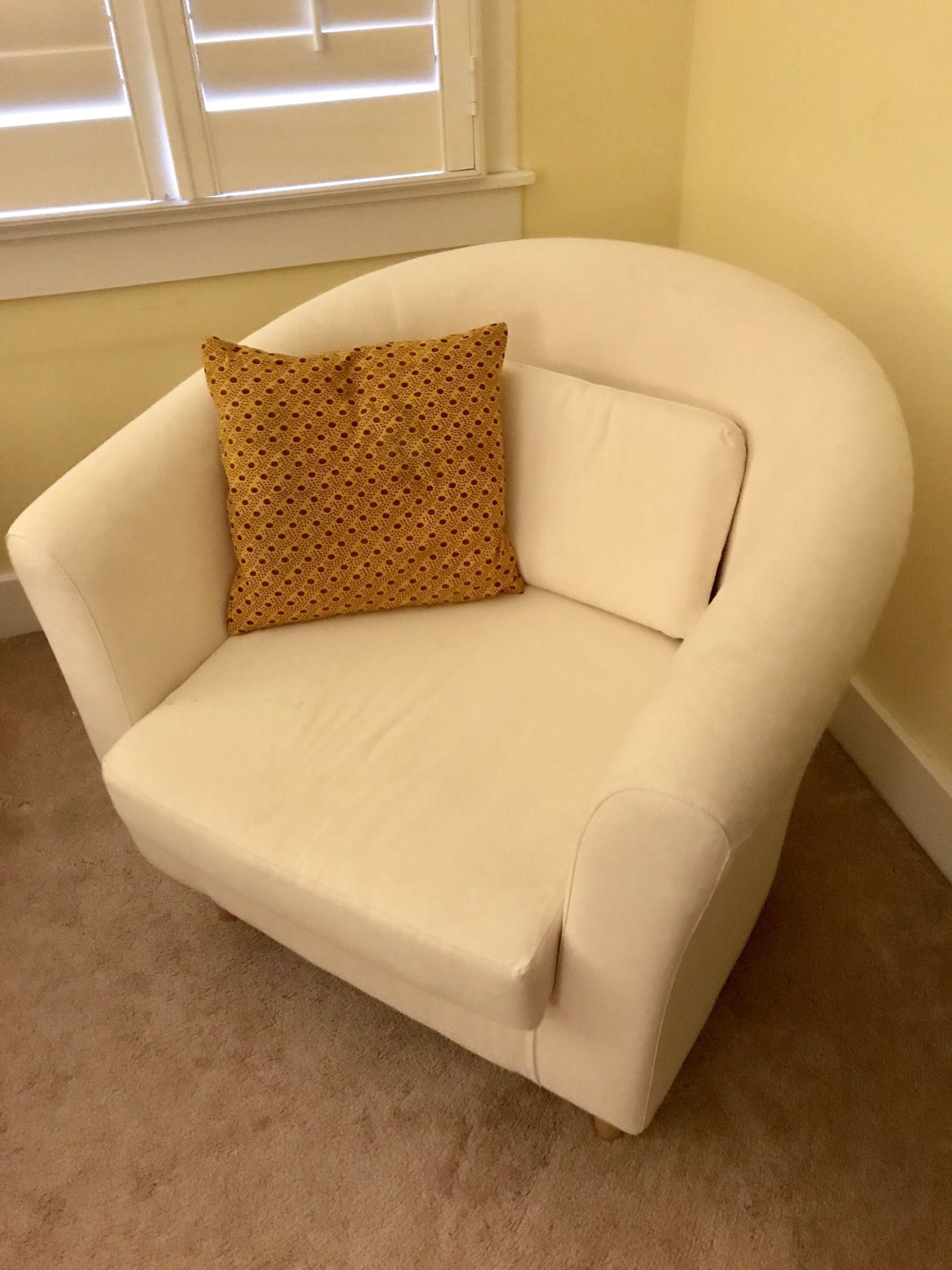 Comfy corner chair. Compact shape. Good fit. 25” deep, 29” tall, 30” wide. Light clean lines.