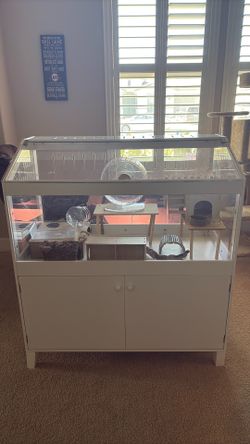 Hamster enclosure with supplies